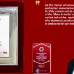 Award plaque and photograph of Sri City MD